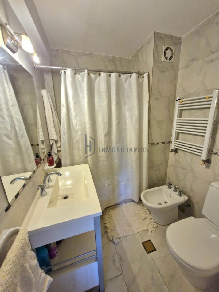 DEPARTAMENTO DE 2 DORMITORIOS Y COCHERA - ZONA CENTRO