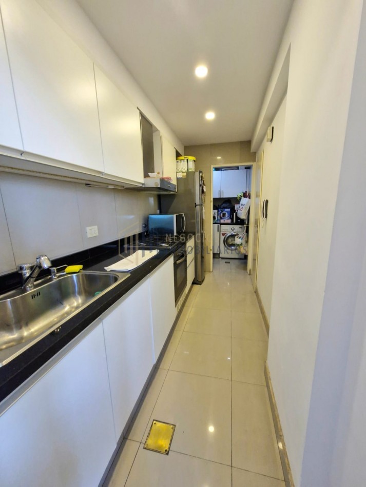 DEPARTAMENTO DE 2 DORMITORIOS Y COCHERA - ZONA CENTRO