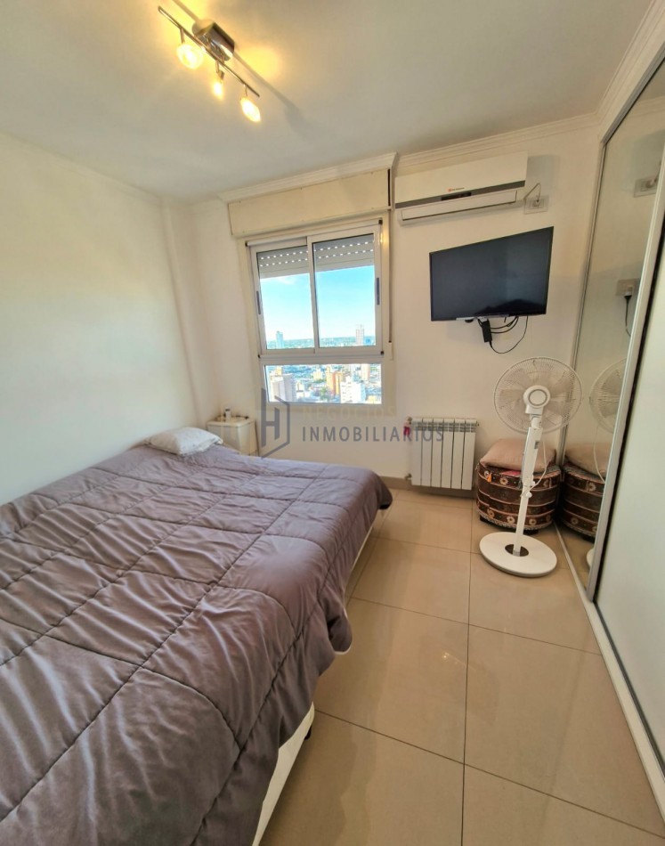 DEPARTAMENTO DE 2 DORMITORIOS Y COCHERA - ZONA CENTRO